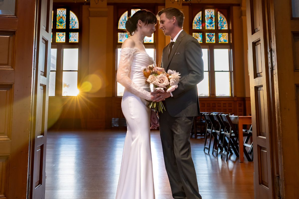 junior bridesmaid with floral crown and poofy dress and ring bearer